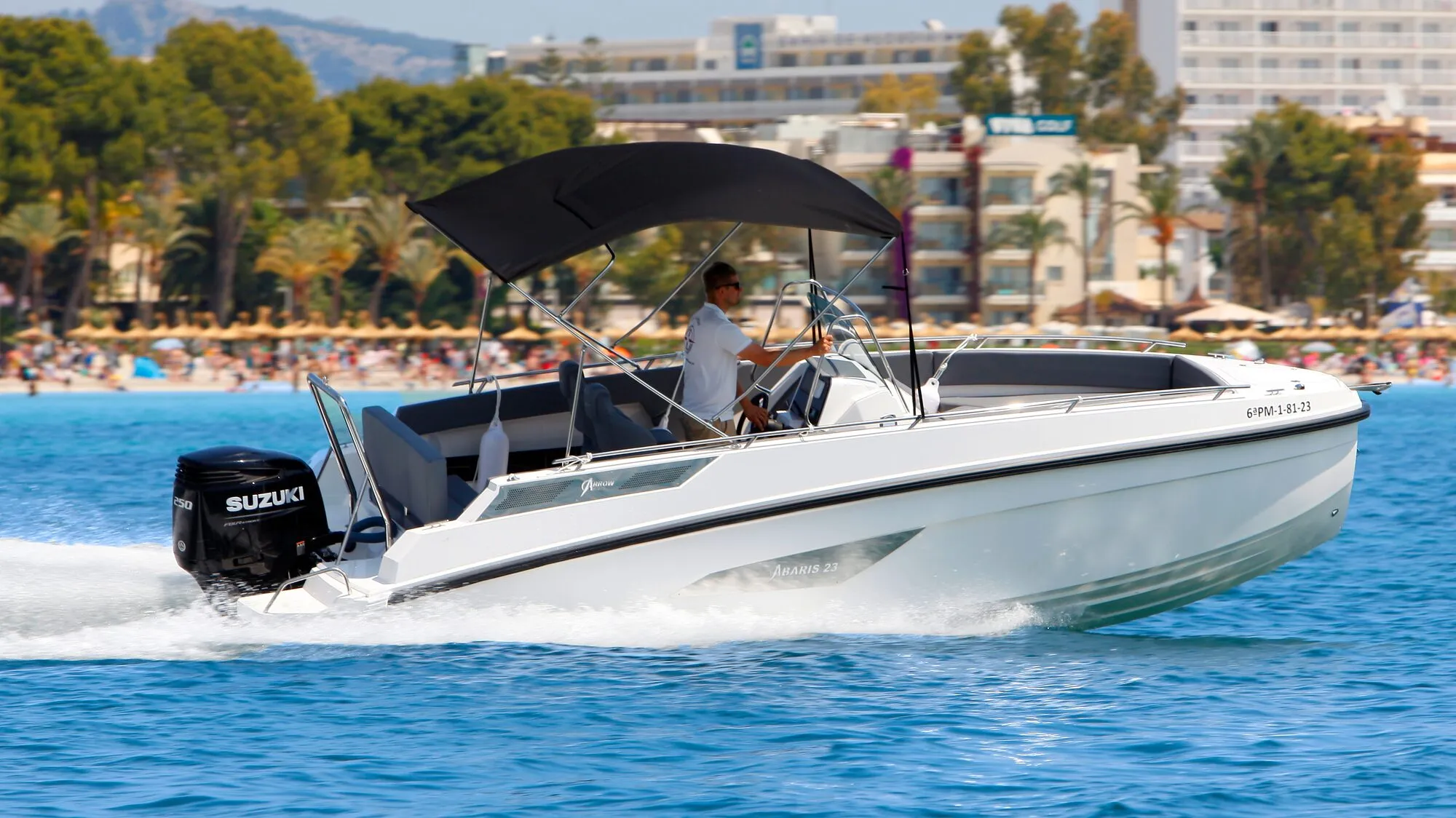 Abaris 23 cruising in front of Alcudia beach