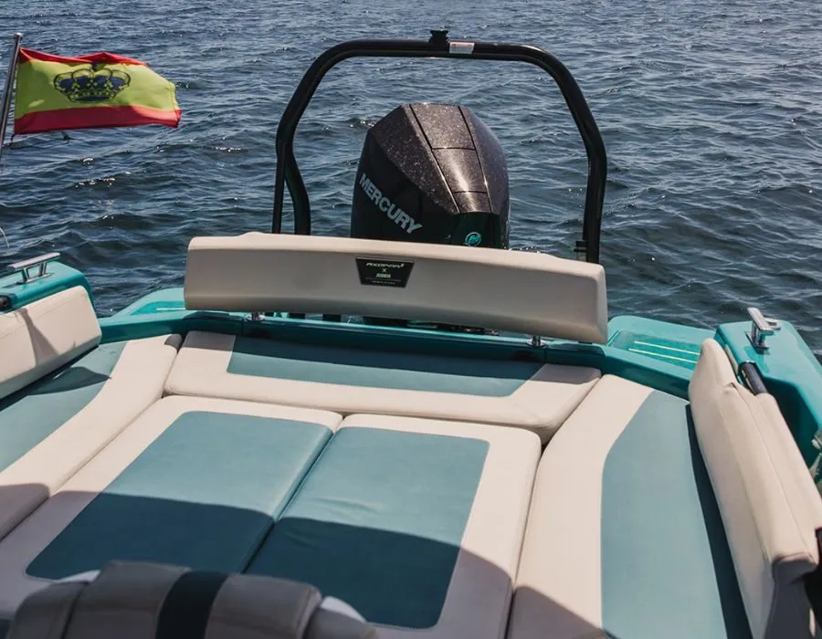 Stern sun pad of the Axopar 22 Spyder with the outboard engine behind