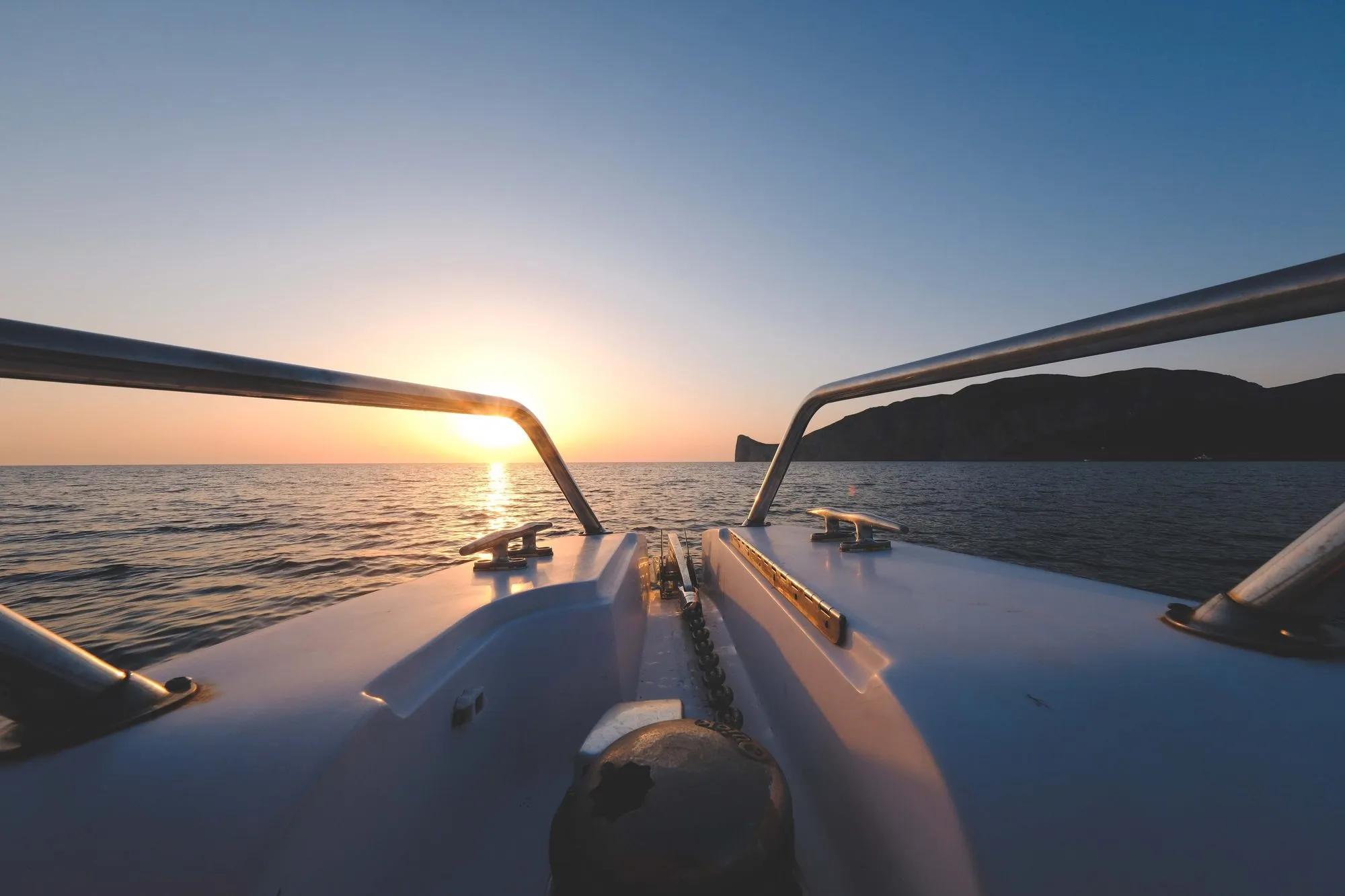 Sunset seen from the deck of a small boat